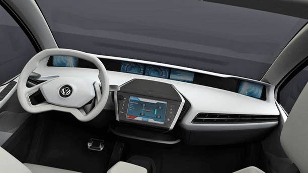 We started with a Volkswagen, so it's only fitting to end with one. V-Dub tapped the famed Giugiaro design house to create a hatch for the 21st century and the Go is the perfect embodiment of an eco-friendly three-door for the future. The most striking feature is the five screens mounted against the windshield, allowing the driver to glance at information without having to move his eyes too far off the road. The two displays mounted on either end serves as the side-view mirrors, while the three central displays provide the usual speed, stereo and navigation information. A touchscreen is mounted in the center to control it all and also displays a back-up camera when the Go is put into reverse. It's an impressive setup, but VW better get a handle on screen glare before it puts it into production. Did we say we're ending? Not quite, we've got two more interiors from Geneva that deserve mentioning.