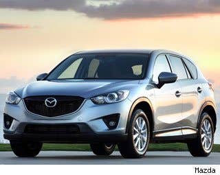 MSRP: $20,695 - $28,295 Invoice: $19,794 - $27,056  Fuel Economy: 26 mpg City, 35 mpg Highway  This is probably the most enjoyable crossover we have driven and we highly recommend checking this out if you need to graduate from a smaller, sporty car to something bigger. The CX-5 boasts Mazda's legendary driving dynamics and also produces fantastic fuel economy.  It's not the quickest car on the road, but the sporty suspension and crisp steering make this car extremely enjoyable.  Research the Mazda CX-5 Mazda CX-5 Photos & Information Mazda CX-5 Specs Mazda CX-5 Local Dealer Price Quote