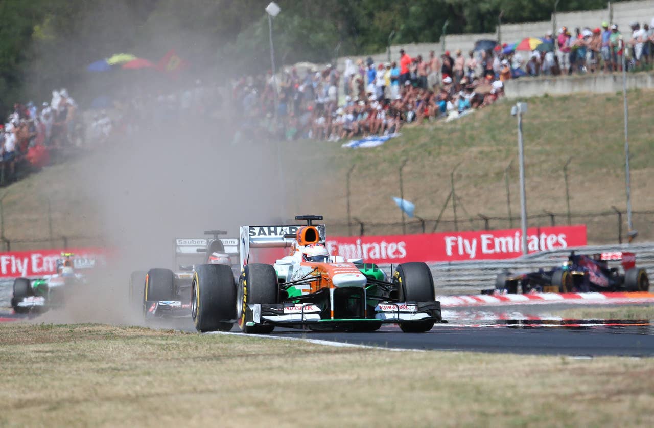 Force India's Scottish driver Paul di Resta drives at the Hungaroring circuit in Budapest on July 28, 2013 during the Hungarian Formula One Grand Prix.     AFP PHOTO / FERENC ISZAFERENC ISZA/AFP/Getty Images