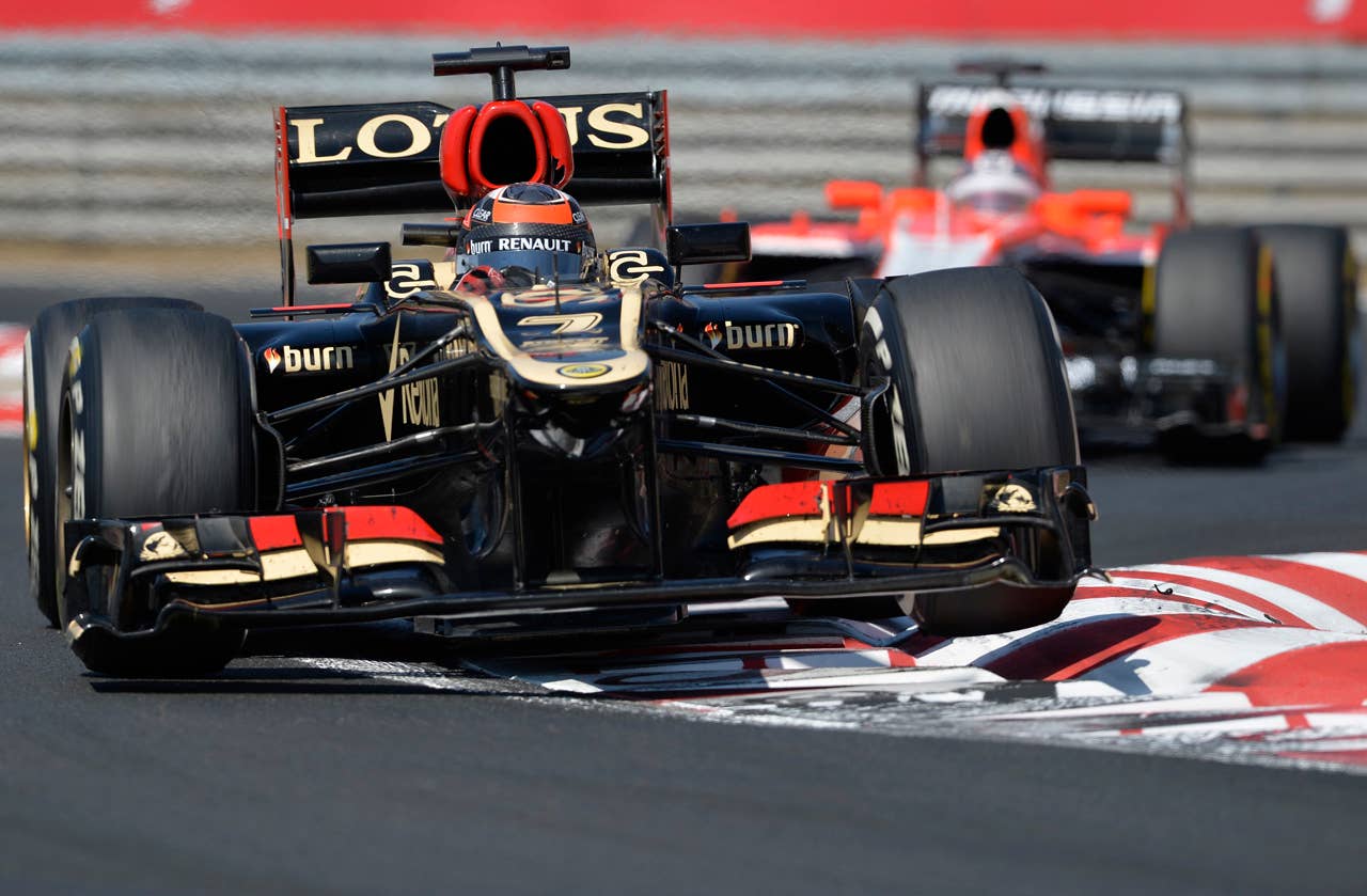Lotus driver Kimi Raikkonen of Finland drives his race car during the Formula One Hungarian Grand Prix at the Hungaroring racetrack, near Budapest, Hungary, Sunday, July 28, 2013. Raikkonen arrived in second position. (AP Photo/Bela Szandelszky)