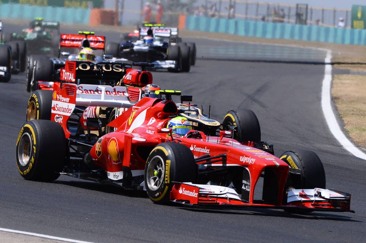 Ferrari's Brazilian driver Felipe Massa drives at the Hungaroring circuit in Budapest on July 28, 2013 during the Hungarian Formula One Grand Prix.    AFP PHOTO / ATTILA KISBENEDEKATTILA KISBENEDEK/AFP/Getty Images