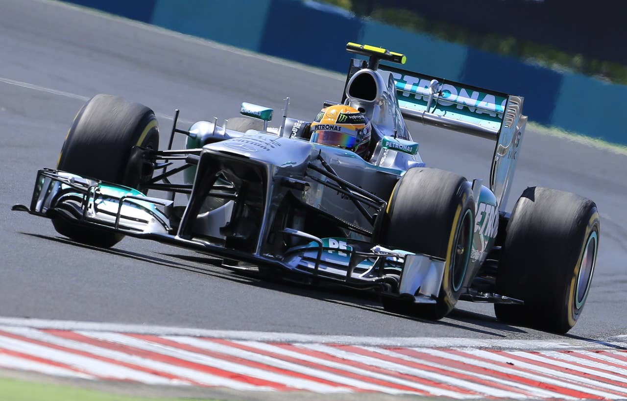 Mercedes'  British driver Lewis Hamilton  drives at the Hungaroring circuit in Budapest on July 28, 2013 during the Hungarian Formula One Grand Prix. AFP PHOTO / ALEXANDER KLEINALEXANDER KLEIN/AFP/Getty Images