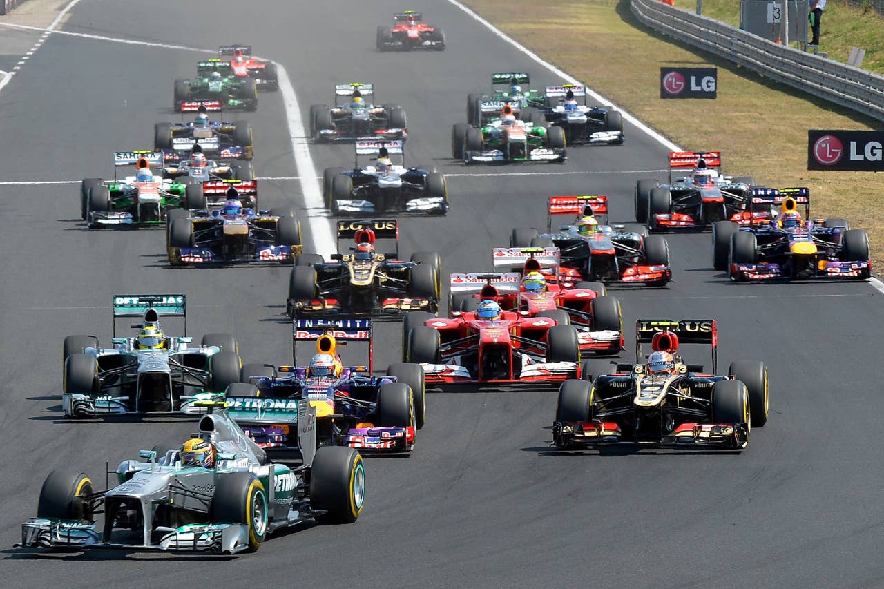 TOPSHOTS Mercedes'  British driver Lewis Hamilton leads after the start at the Hungaroring circuit in Budapest on July 28, 2013 during the Hungarian Formula One Grand Prix.   AFP PHOTO / TOM GANDOLFINITom Gandolfini/AFP/Getty Images