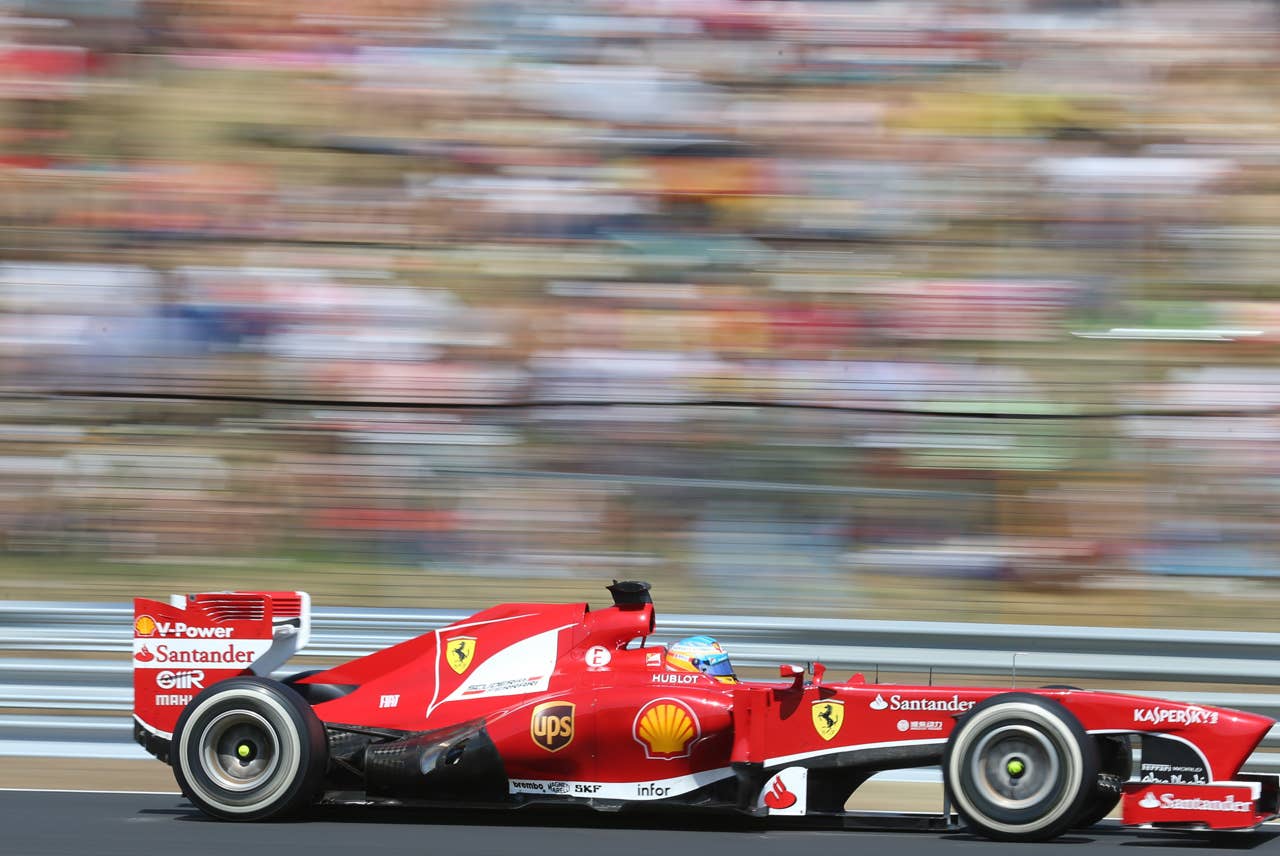 Ferrari's Spanish driver Fernando Alonso drives at the Hungaroring circuit in Budapest on July 28, 2013 during the Hungarian Formula One Grand Prix.     AFP PHOTO / FERENC ISZAFERENC ISZA/AFP/Getty Images