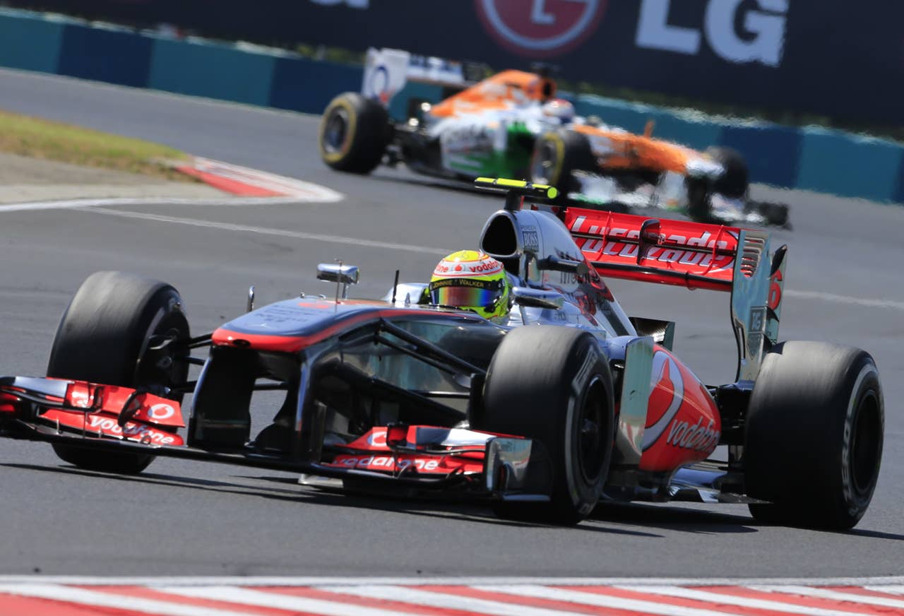 McLaren Mercedes' Mexican driver Sergio Perez  drives at the Hungaroring circuit in Budapest on July 28, 2013 during the Hungarian Formula One Grand Prix. AFP PHOTO / ALEXANDER KLEINALEXANDER KLEIN/AFP/Getty Images