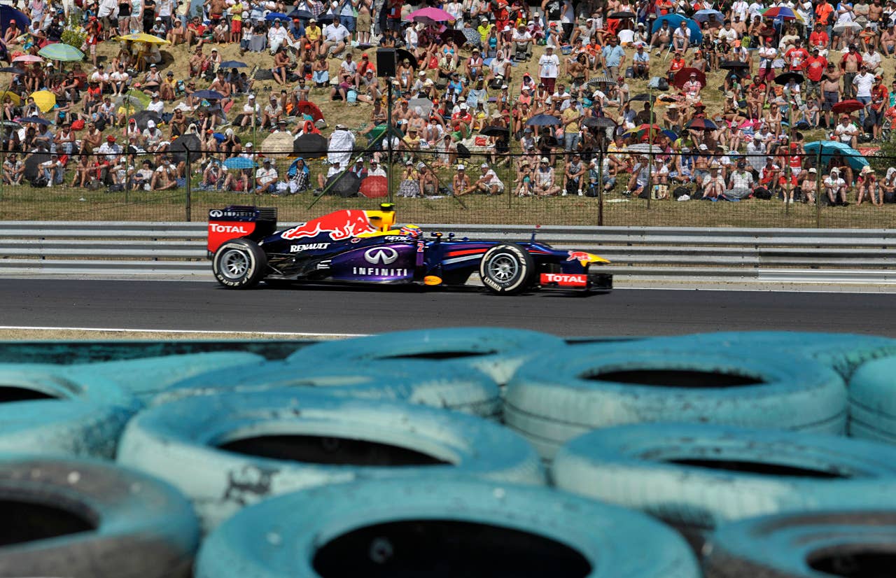 Red Bull driver Mark Webber of Australia drives his race car during the Formula One Hungarian Grand Prix at the Hungaroring racetrack, near Budapest, Hungary, Sunday, July 28, 2013. (AP Photo/Bela Szandelszky)