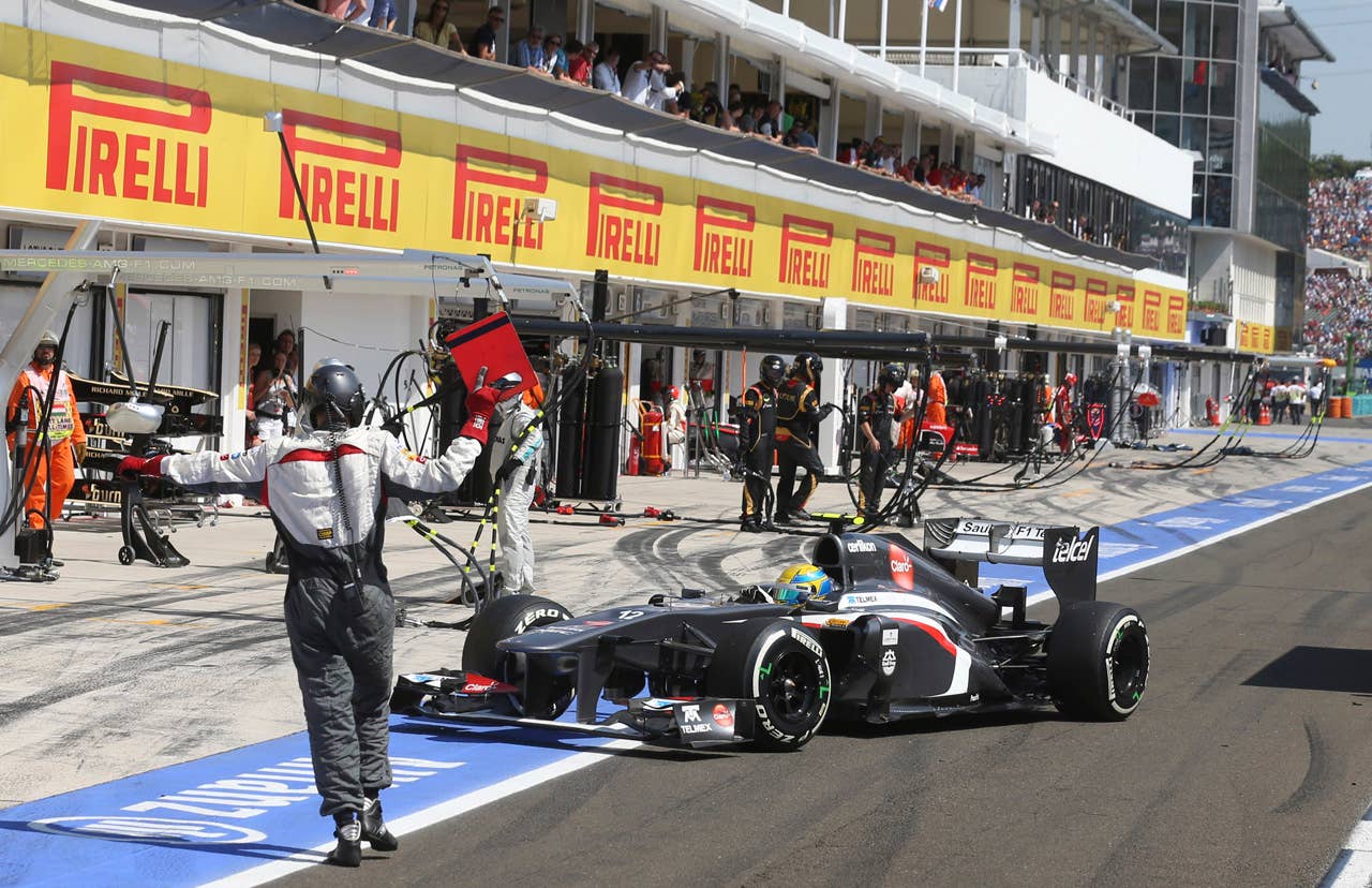 Sauber's Mexican driver Esteban Gutierrez enters the pits at the Hungaroring circuit in Budapest on July , 2013 during the Hungarian Formula One Grand Prix.  AFP PHOTO / LUCA BRUNOLUCA BRUNO/AFP/Getty Images