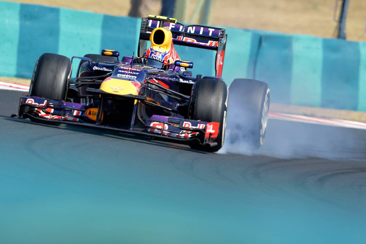 Red Bull driver Mark Webber of Australia drives his race car during the Formula One Hungarian Grand Prix at the Hungaroring racetrack, near Budapest, Hungary, Sunday, July 28, 2013. (AP Photo/Bela Szandelszky)