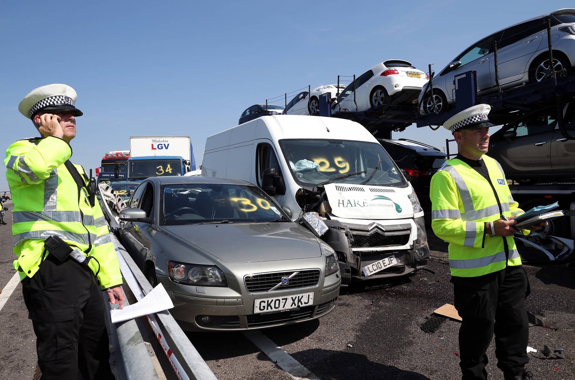 ISLE OF SHEPPEY, KENT - SEPTEMBER 05:  Emergency Services attend the site of a major traffic accident on the A249 Sheppey crossing bridge in Kent on September 5, 2013 in Isle of Sheppey, Kent. Over 130 vehicles were involved in the series of accidents, with thick fog blamed for poor visibility. The crash occurred around 07:15AM BST, with at least 8 people suffering serious injuries, and approximately 60 people treated for minor injuries.  (Photo by Peter Macdiarmid/Getty Images)