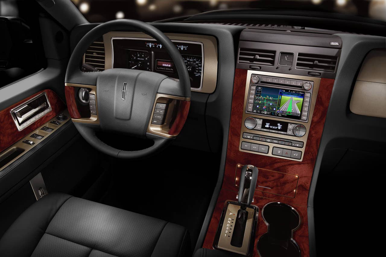 2013 Lincoln Navigator: The seven-passenger 2013 Lincoln Navigator continues to be a luxurious offering with standard heated and cooled front seats, power-deployed running boards, power-fold third-row seat, and Navigation with THX Surround Sound audio. (06/21/2012)
