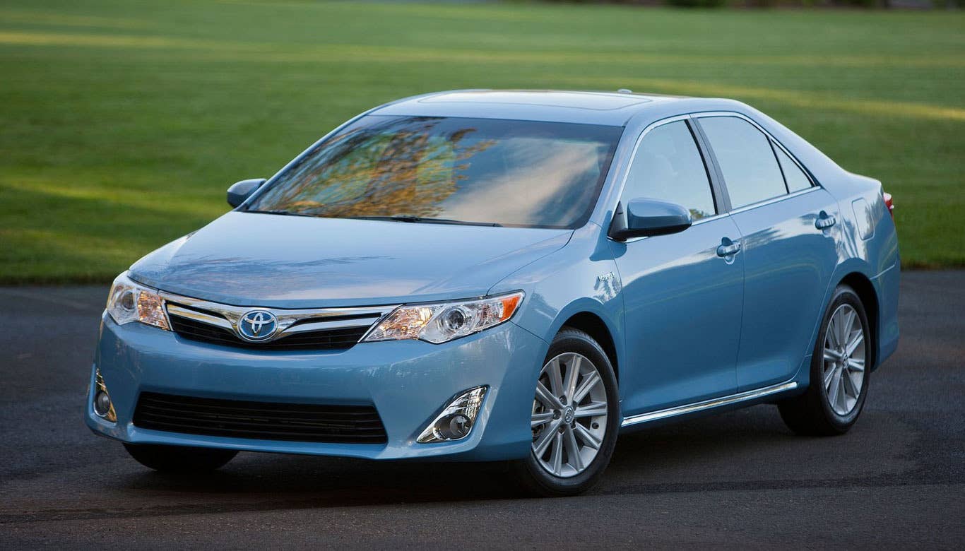 Sticker Price: $26,140 - $28,625 Invoice Price: $24,049 - $26,336 Fuel Economy: 43 mpg City, 39 mpg Highway  Cost Over First Five Years: $31,800  Boasting the room and versatility of a midsize sedan in conjunction with great fuel economy and reliability, it's no surprise that the Toyota Camry Hybrid -- the variation of the best-selling passenger car in America -- doesn't cost much to own.  Research the Toyota Camry Hybrid Toyota Camry Hybrid Overview Toyota Camry Hybrid Photos & Video Toyota Camry Hybrid Local Dealer Price Quote