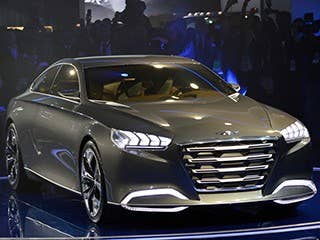 We just don't know what Hyundai was thinking. The original Genesis is a very nice piece of work. The Sonata, Elantra, Santa Fe and Accent are all top-notch designs that are keeping executives at Ford, Toyota and Honda up at night.  This is a concept design that is meant to point to where they are thinking with a new Genesis. The front end is massive and out of proportion. The back view is the dog's dinner. To our friends at Hyundai, we say:"Think Again." - David Kiley