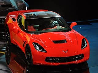 Really? Do we have to explain the allure of the Chevy Corvette? Well, OK. If you insist.  The Stingray name returns for Corvette's seventh generation, and along with it an edgier design that is sure to ruffle some feathers of Corvette purists. Namely, the car's rear end, which now features squared off tail lamps. To our eye, we appreciate that the car has gotten lower, wider and more angular, but feel that all the vents and a two-toned rear bumper is a bit busy.  The Corvette got the top vote from three of our editors, and it appeared on our other two editors' lists as well.- Adam Morath