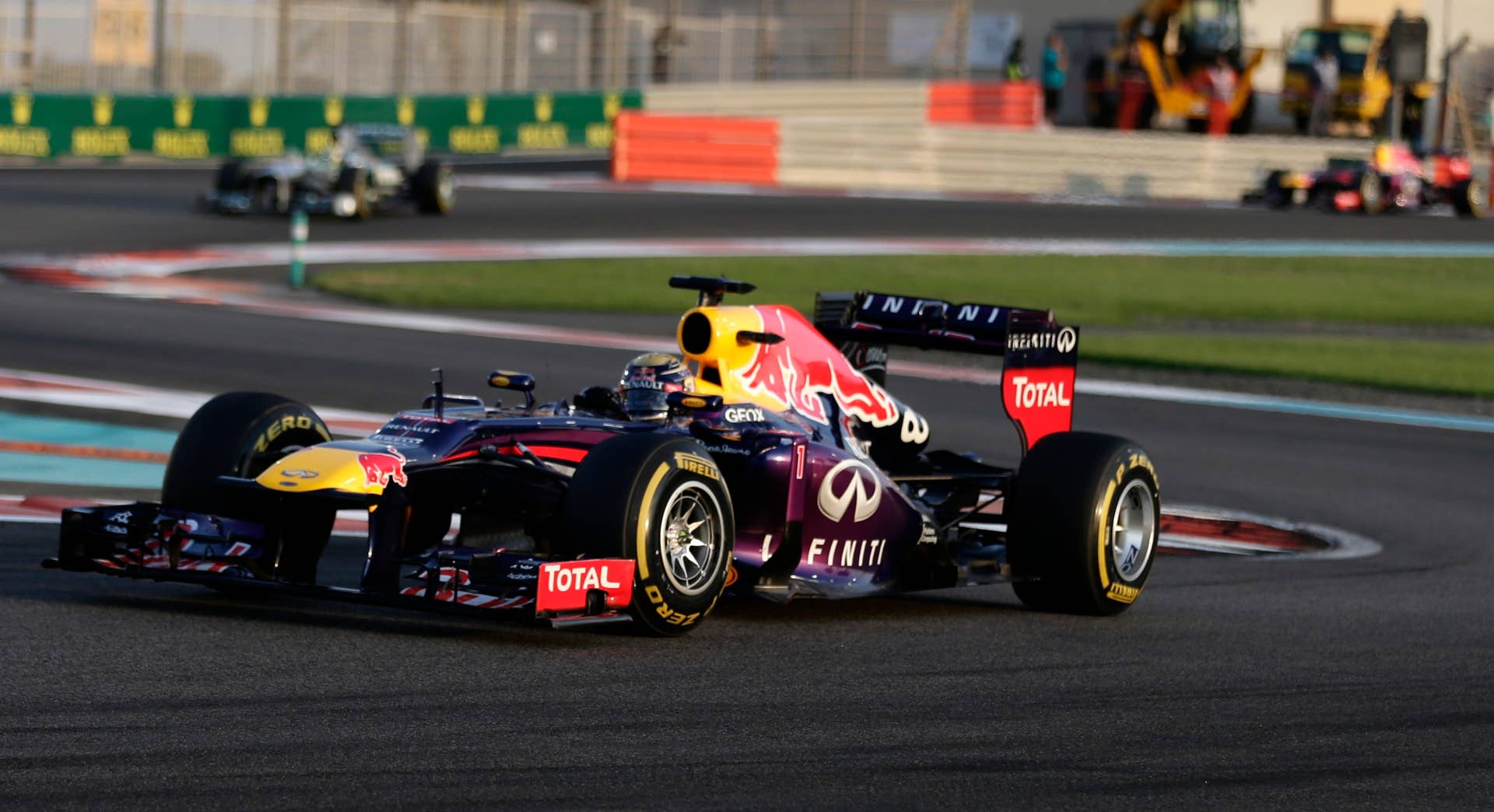 Red Bull driver Sebastian Vettel of Germany steers his car during the Emirates Formula One Grand Prix at the Yas Marina racetrack in Abu Dhabi, United Arab Emirates, Sunday, Nov. 3, 2013. (AP Photo/Hassan Ammar)