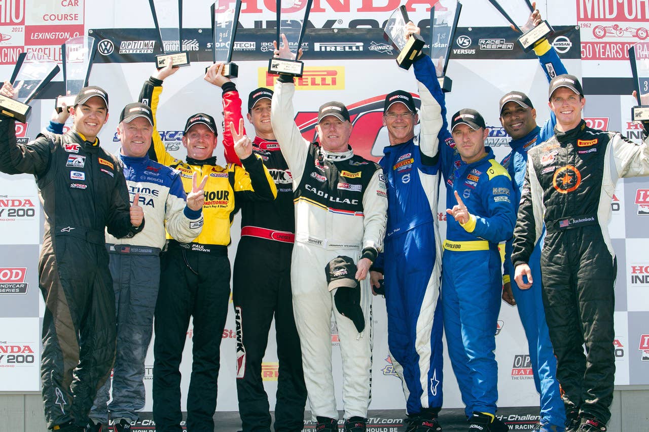 Cadillac Racing, SCCA Pro Racing World Challenge, Mid-Ohio Sports Car Course, Lexington, Ohio, August 5-7, 2011. CTS-V #3 driver Johnny O'Connell celebrates his GT class win in the second race of the weekend double-header (Richard Prince/Cadillac Racing Photo).