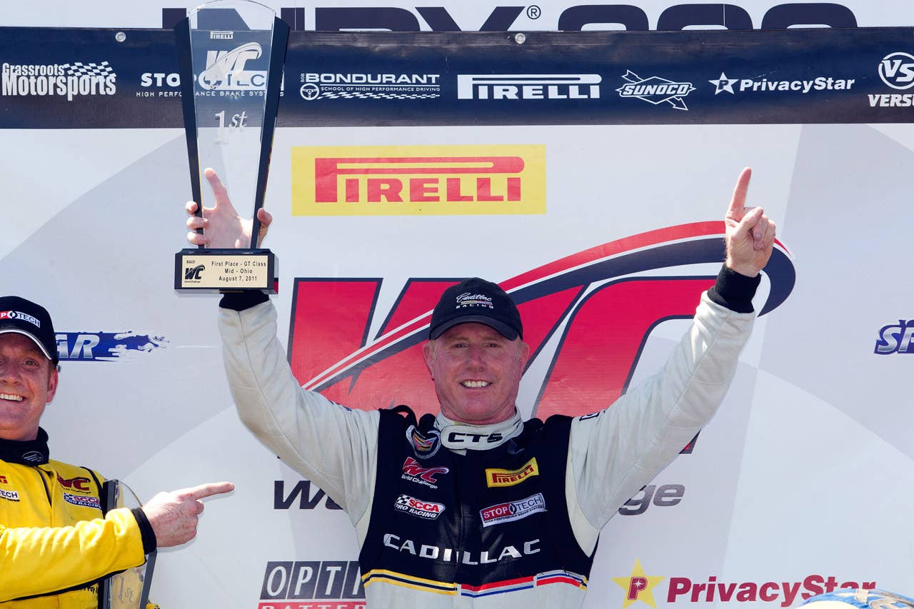 Cadillac Racing, SCCA Pro Racing World Challenge, Mid-Ohio Sports Car Course, Lexington, Ohio, August 5-7, 2011. CTS-V #3 driver Johnny O'Connell celebrates his GT class win in the second race of the weekend double-header (Richard Prince/Cadillac Racing Photo).