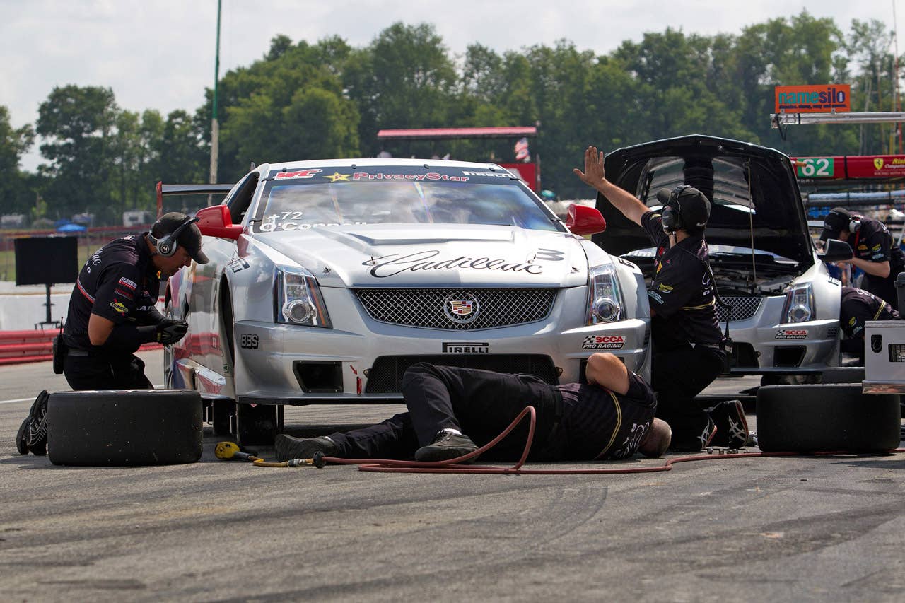 Cadillac Racing, SCCA Pro Racing World Challenge, Mid-Ohio Sports Car Course, Lexington, Ohio, August 5-7, 2011. Fine tuning suspension adjustments can easily make the difference between winning and losing. The Cadillac Racing crew works hard during every practice session in their effort to help the drivers find more speed (Richard Prince/Cadillac Racing Photo).