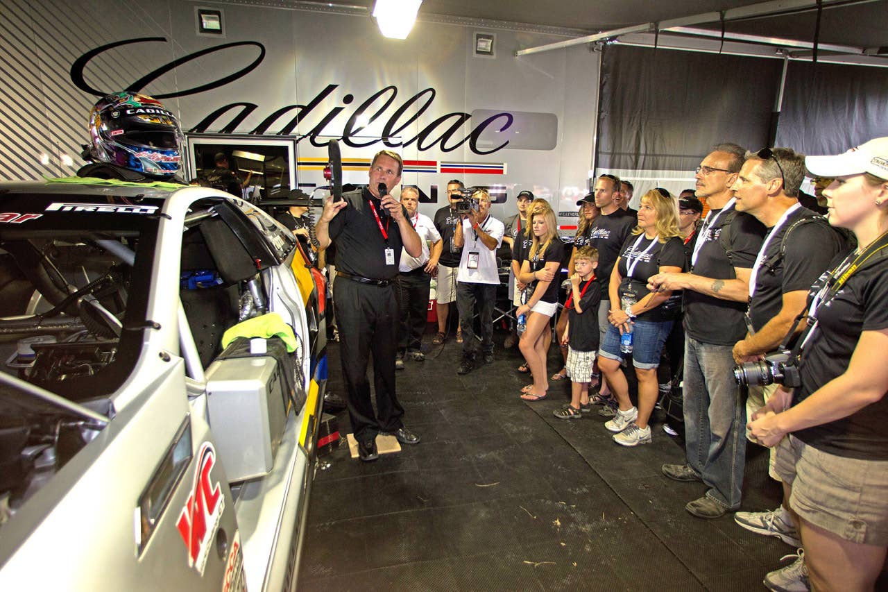Cadillac Racing, SCCA Pro Racing World Challenge, Mid-Ohio Sports Car Course, Lexington, Ohio, August 5-7, 2011. Director of GM Racing Mark Kent explains the inner workings of the magnificent CTS-V race car to a group of Cadillac employees and other enthusiasts (Richard Prince/Cadillac Racing Photo).