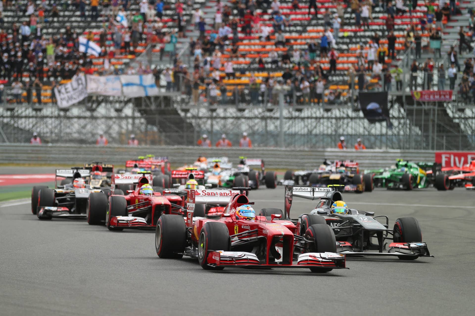 YEONGAM-GUN, SOUTH KOREA - OCTOBER 06:  Fernando Alonso of Spain and Ferrari drives during the Korean Formula One Grand Prix at Korea International Circuit on October 6, 2013 in Yeongam-gun, South Korea.  (Photo by Clive Rose/Getty Images)