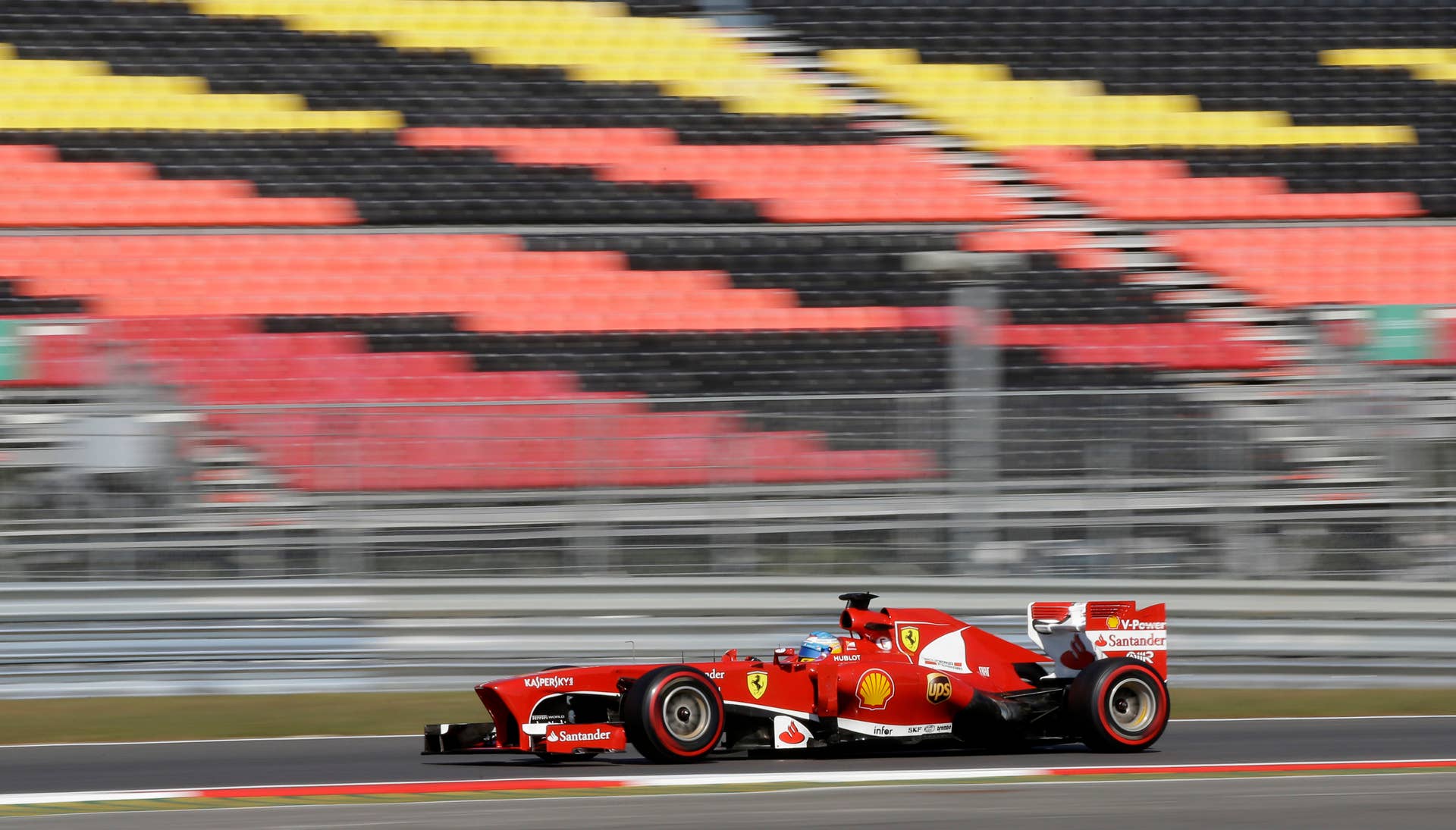 Ferrari driver Fernando Alonso of Spain  steers his car during the second practice session for the Korean Formula One Grand Prix at the Korean International Circuit in Yeongam, South Korea, Friday, Oct. 4, 2013. (AP Photo/Lee Jin-man)