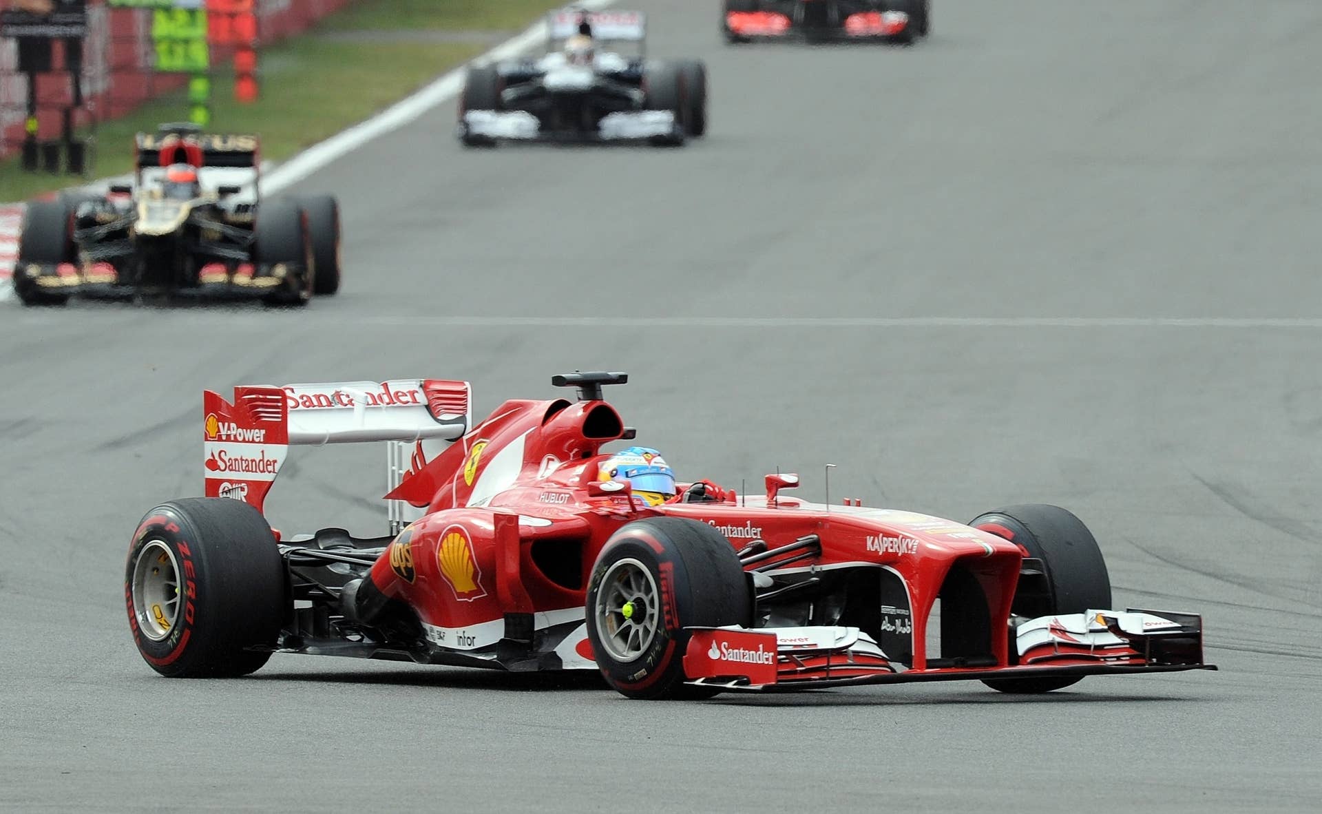 Ferrari driver Fernando Alonso of Spain drives during the Formula One Korean Grand Prix in Yeongam on October 6, 2013. AFP PHOTO/ Prakash SINGH        (Photo credit should read PRAKASH SINGH/AFP/Getty Images)
