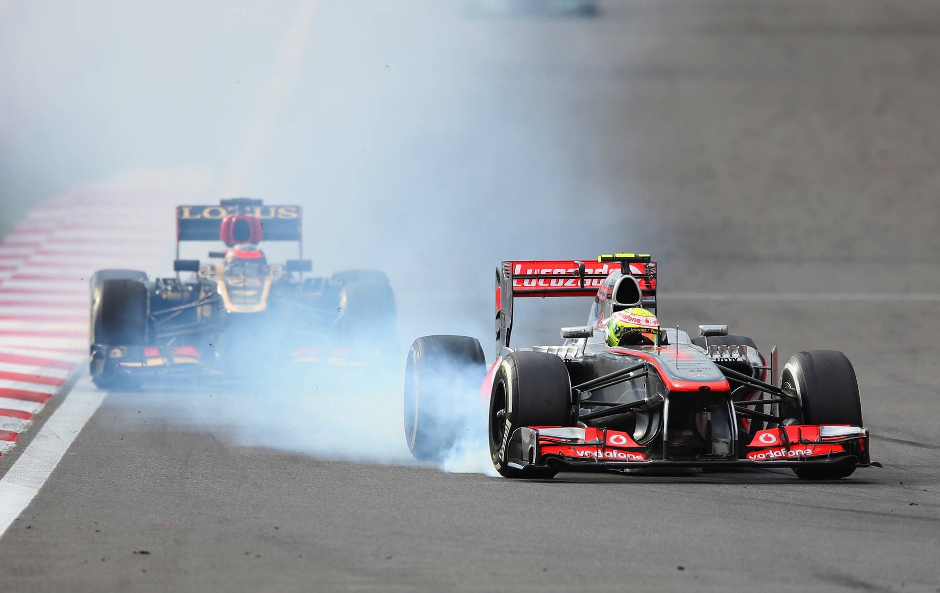 YEONGAM-GUN, SOUTH KOREA - OCTOBER 06:  Sergio Perez of Mexico and McLaren locks his brakes while driving during the Korean Formula One Grand Prix at Korea International Circuit on October 6, 2013 in Yeongam-gun, South Korea.  (Photo by Clive Rose/Getty Images)