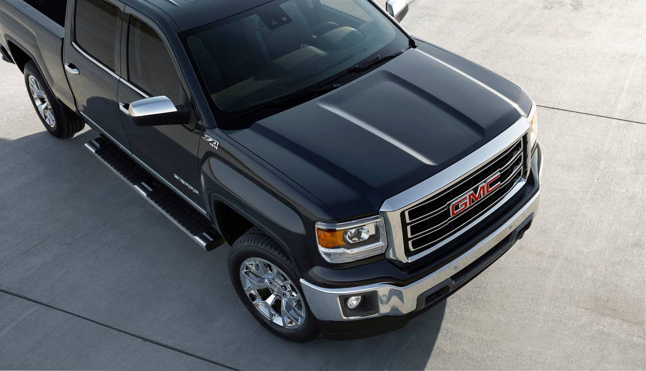 2014 GMC Sierra SLT Crew Cab shot from above shows the sculpted aluminum hood that is 17 lbs lighter than the 2013 model.