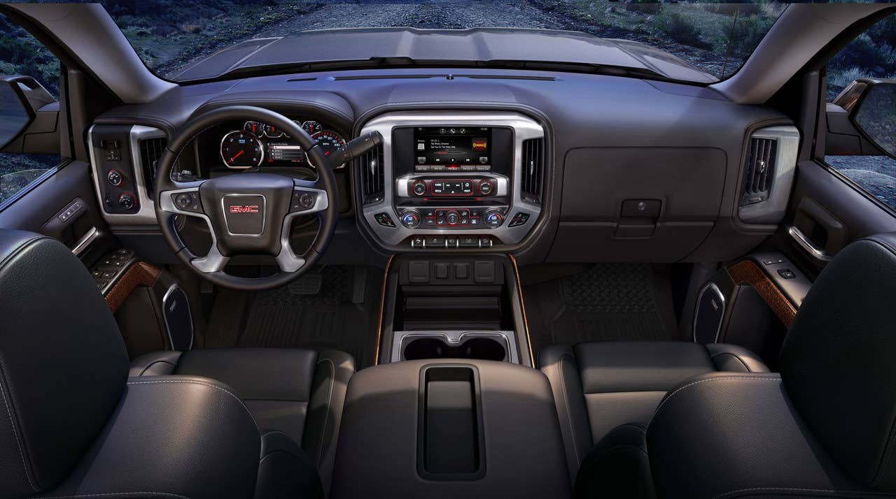 The all new interior on the 2014 GMC Sierra SLT has an upright instrument panel with clear, easy to use controls.