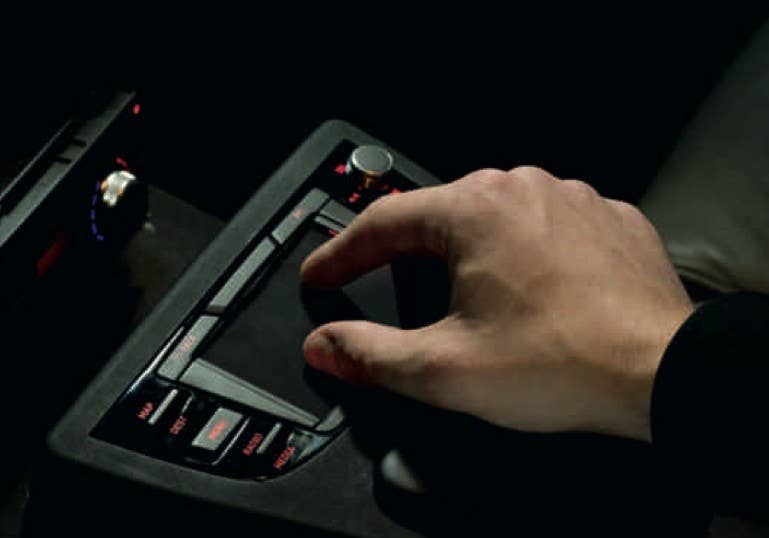 Multitouch Controls    The Audi Touchpad– originally fitted to the A8 – was the first application of a touch-based input pad in a vehicle, and Audi will be bringing a revised version that's integrated into the MMI knob in the 2013 A3.  Beyond that, Audi is working on a new multitouch system similar to that found on smartphones and tablets that incorporates tactile feedback, and partnered with new head-up displays, voice controls and gestures, hopes to reduce driver distraction while increasing control.  ETA: When's the next A8 coming? Around 2015.