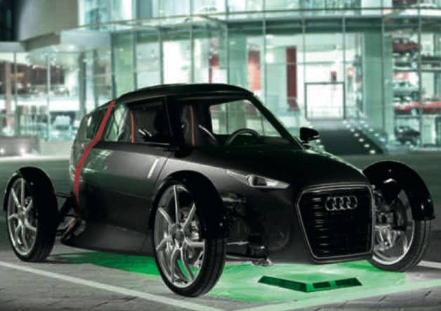 Audi Wireless Charging Audi is still at least a year away from bringing a fully electric model to market, and like every automaker pursuing EVs, charging is a major component. To that end, Audi– like Nissan, GM and others – is patterning with WiTricity Corporation from Boston, which manufacturers a coil-based inductive charging system that utilizes one coil installed in the ground and tapping into the grid, with another coil mounted underneath the vehicle. Alternating current in the embedded coil creates an alternating magnetic field that flows through the air and sends the voltage to the car-mounted coil. It can be mounted anywhere and according to Audi isn't just safe, but the system isn't affected by rain, snow or ice. ETA: Two to three years.
