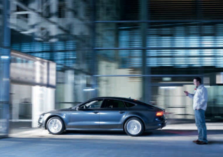 Garage Parking Pilot When the vehicle reaches the entrance of the garage, the local wireless network detects the car's arrival and a"digital thread" allows the driver to take his or her hands off the wheel and the be autonomously piloted directly to his space. Vehicle-to-vehicle networking should ensure collisions aren't an issue, and when you're done dining or catching a flick, you simply open an app on your smartphone to have your car waiting for you at the entrance. ETA: It's all about infrastructure, so figure a decade or more.