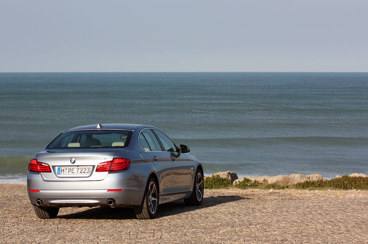 2013 BMW ActiveHybrid 5 rear 3/4 view