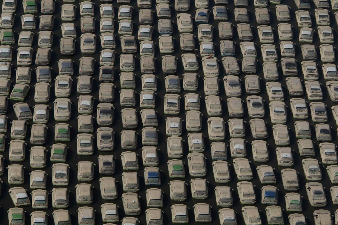 Vehicles at Honda auto factory are submerged in floodwaters at the Rojana industrial district in Ayutthaya, central Thailand Wednesday, Nov. 23, 2011. Honda's auto factory in Thailand remains closed because of the floodwaters. (AP Photo/Sakchai Lalit)