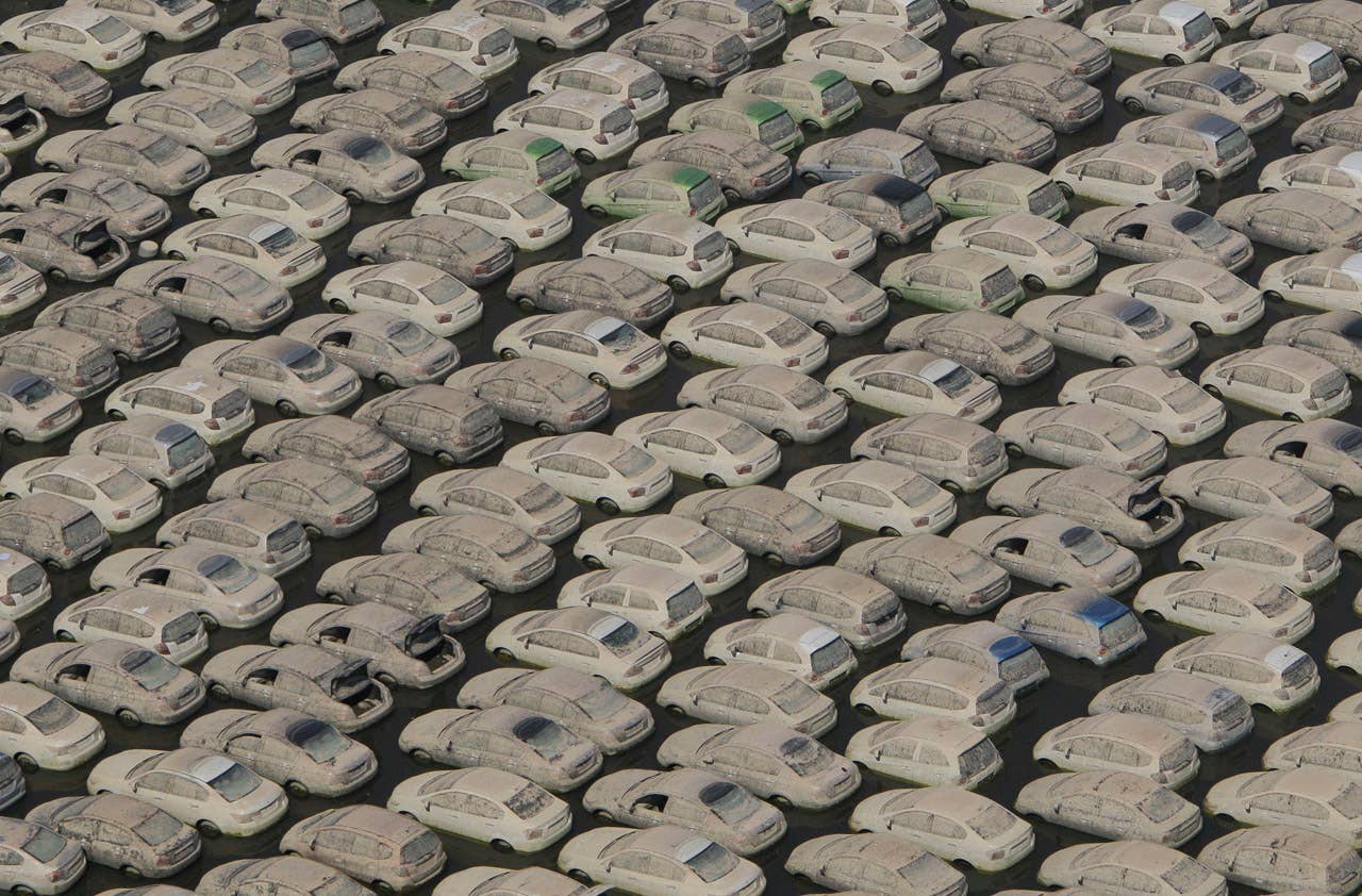 Vehicles at Honda auto factory are submerged in floodwaters at the Rojana industrial district in Ayutthaya, central Thailand Wednesday, Nov. 23, 2011. Honda's auto factory in Thailand remains closed because of the floodwaters. (AP Photo/Sakchai Lalit)
