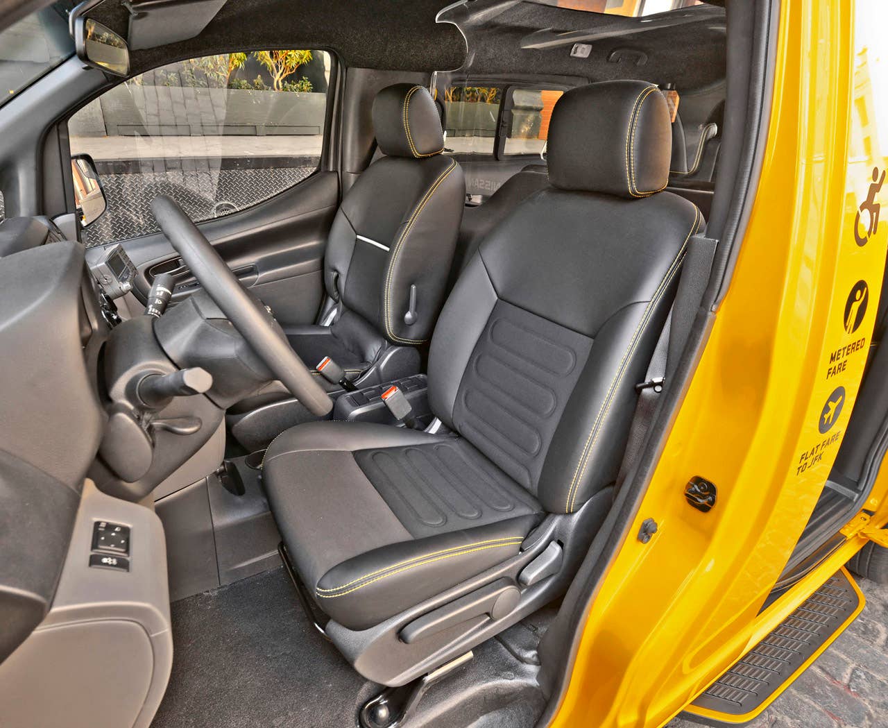 NEW YORK (Mar. 27, 2013)  As Nissans innovative NV200 taxi gets ready to take to the streets of New York City this coming fall, another crucial part of the Taxi of Tomorrow program was unveiled today at the New York International Auto Show  the wheelchair accessible NV200 Mobility NY Taxi. Working in conjunction with BraunAbility, the Indiana-based market leader in wheelchair accessible vehicles and wheelchair lifts, the Nissan NV200 Mobility Taxi features a rear-entry ramp and an industry-first integrated restraint system that provides safe and quick securement of wheelchairs.