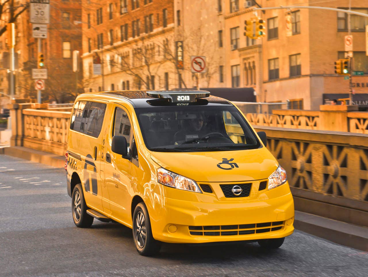 NEW YORK (Mar. 27, 2013)  As Nissans innovative NV200 taxi gets ready to take to the streets of New York City this coming fall, another crucial part of the Taxi of Tomorrow program was unveiled today at the New York International Auto Show  the wheelchair accessible NV200 Mobility NY Taxi. Working in conjunction with BraunAbility, the Indiana-based market leader in wheelchair accessible vehicles and wheelchair lifts, the Nissan NV200 Mobility Taxi features a rear-entry ramp and an industry-first integrated restraint system that provides safe and quick securement of wheelchairs.