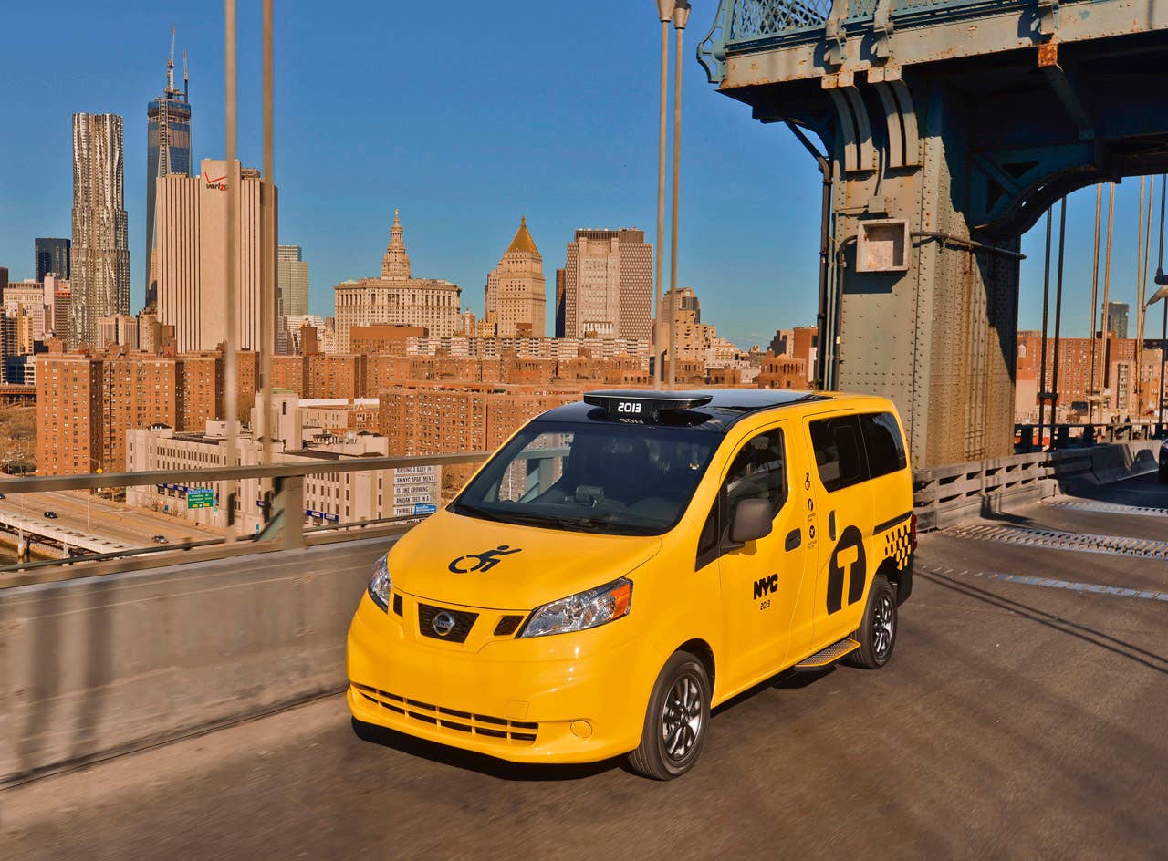 NEW YORK (Mar. 27, 2013)  As Nissans innovative NV200 taxi gets ready to take to the streets of New York City this coming fall, another crucial part of the Taxi of Tomorrow program was unveiled today at the New York International Auto Show  the wheelchair accessible NV200 Mobility NY Taxi. Working in conjunction with BraunAbility, the Indiana-based market leader in wheelchair accessible vehicles and wheelchair lifts, the Nissan NV200 Mobility Taxi features a rear-entry ramp and an industry-first integrated restraint system that provides safe and quick securement of wheelchairs.