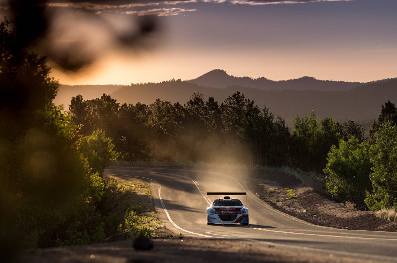 Peugeot 208 T16 driven by Sebastien Loeb at the 2013 Pikes Peak Hill Climb Copyright 2013 Linhbergh Nguyen / AOL