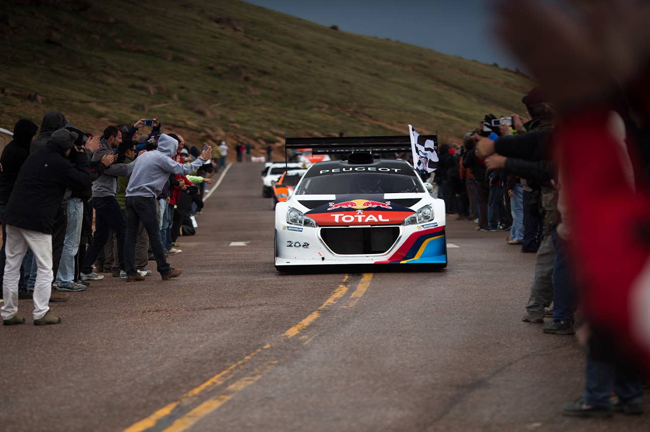 Peugeot 208 T16 driven by Sebastien Loeb at the 2013 Pikes Peak Hill Climb Copyright 2013 Linhbergh Nguyen / AOL
