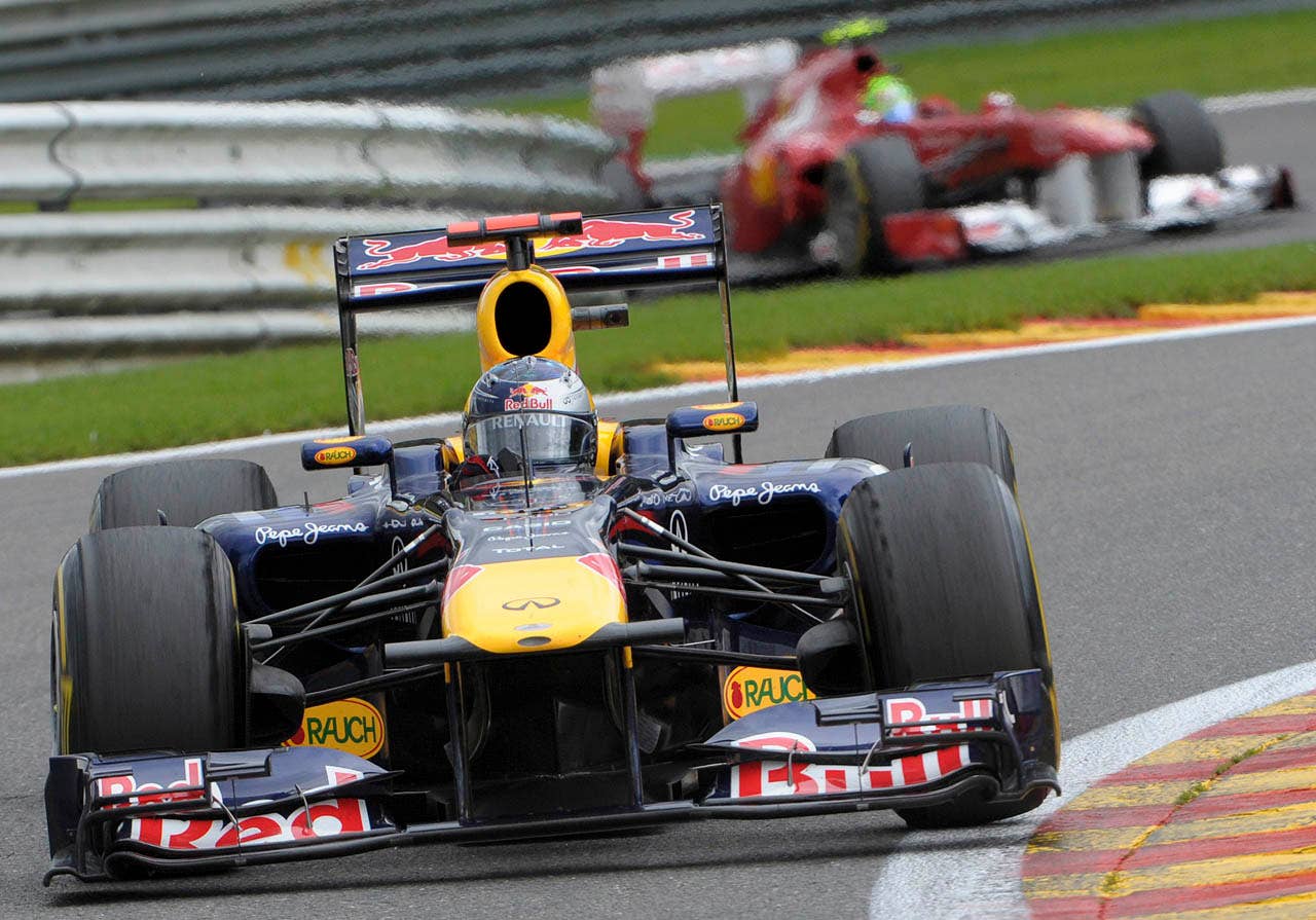 Red Bull driver Sebastian Vettel of Germany steers his car, prior to winning the Belgian Formula One Grand Prix in Spa-Francorchamps, Sunday, Aug. 28, 2011. Red Bull driver Mark Webber of Australia placed second, and McLaren Mercedes driver Jenson Button of Britain placed third. (AP Photo/Geert Vanden Wijngaert)