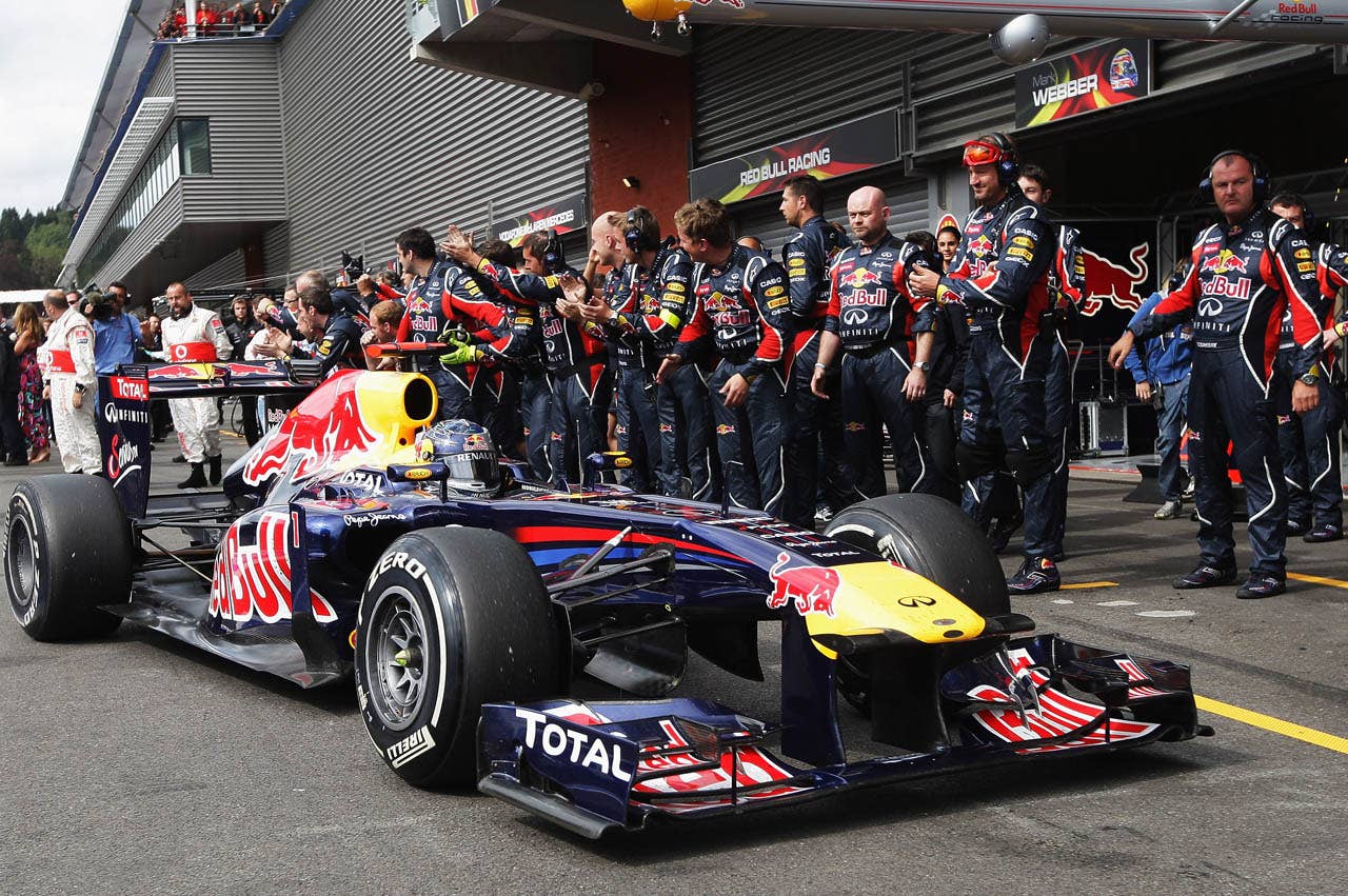 SPA FRANCORCHAMPS, BELGIUM - AUGUST 28:  Sebastian Vettel of Germany and Red Bull Racing celebrates with team mates after winning the Belgian Formula One Grand Prix at the Circuit of Spa Francorchamps on August 28, 2011 in Spa Francorchamps, Belgium.  (Photo by Ker Robertson/Getty Images)