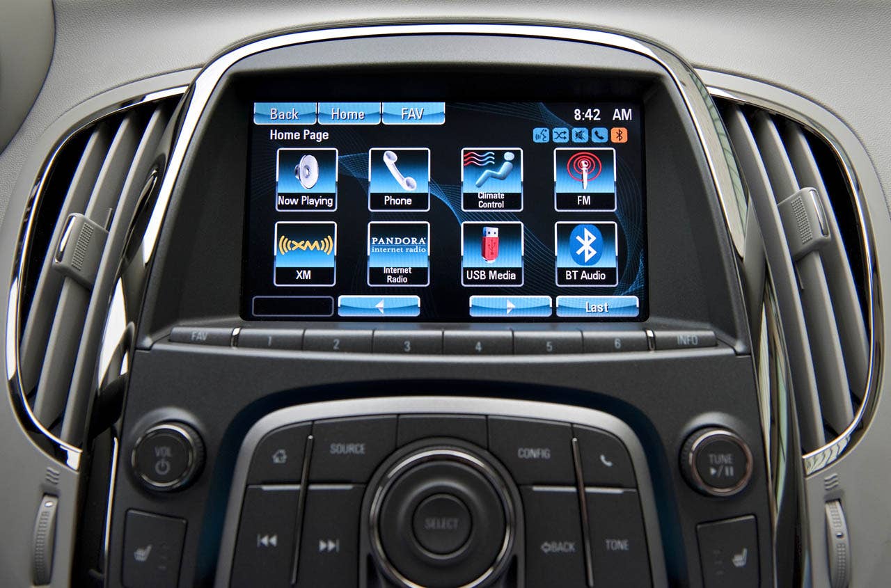 Buick will bring a higher level of in-vehicle wireless connectivity and customizable infotainment options to its 2012 LaCrosse models with Buick IntelliLink, which uses Bluetooth or USB to connect the drivers smartphone to a new 8-inch, high-resolution, full-color touch screen display radio. IntelliLink expands on Buicks current Bluetooth and USB capabilities to allow smartphone control via voice activation and steering wheel-mounted controls. It also enables streaming stereo audio from the phone through services like PANDORA Internet radio and Stitcher SmartRadio. Most importantly, Buick IntelliLink enables seamless integration of stowed portable devices with each vehicles infotainment system, allowing drivers to keep their hands on the wheel and eyes on the road. (Buick News Photo)