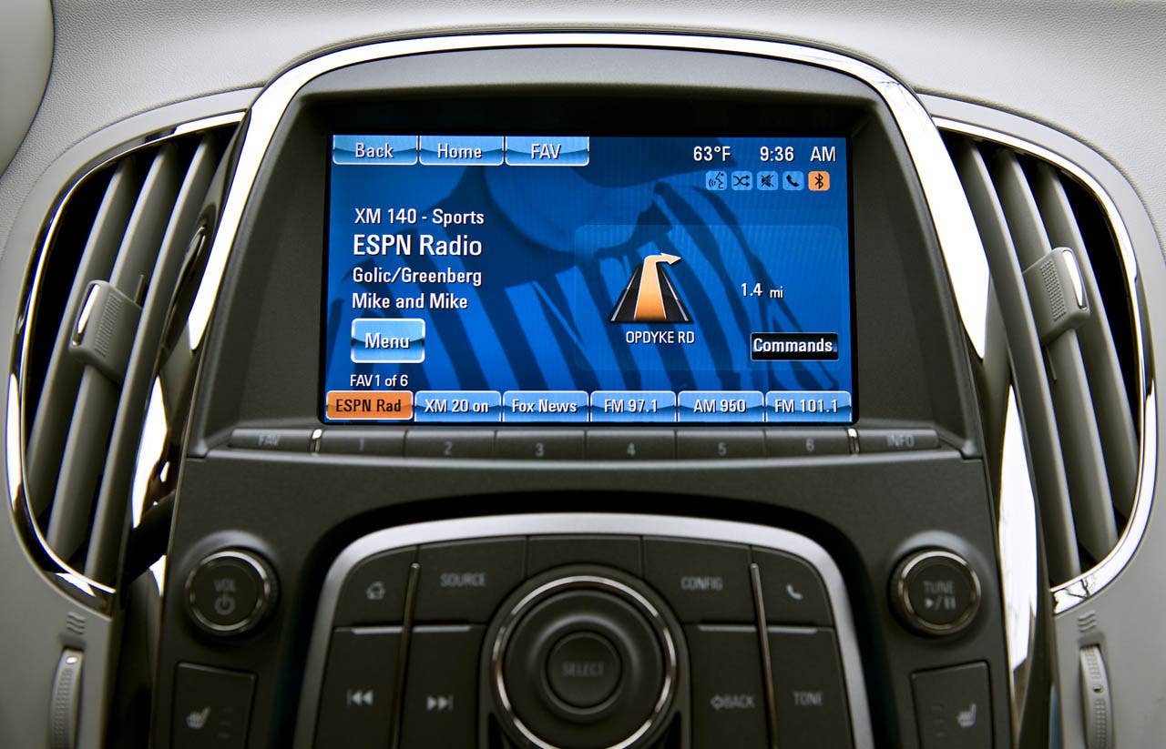 Buick will bring a higher level of in-vehicle wireless connectivity and customizable infotainment options to its 2012 LaCrosse models with Buick IntelliLink, which uses Bluetooth or USB to connect the drivers smartphone to a new 8-inch, high-resolution, full-color touch screen display radio. IntelliLink expands on Buicks current Bluetooth and USB capabilities to allow smartphone control via voice activation and steering wheel-mounted controls. It also enables streaming stereo audio from the phone through services like PANDORA Internet radio and Stitcher SmartRadio. Most importantly, Buick IntelliLink enables seamless integration of stowed portable devices with each vehicles infotainment system, allowing drivers to keep their hands on the wheel and eyes on the road. (Buick News Photo)