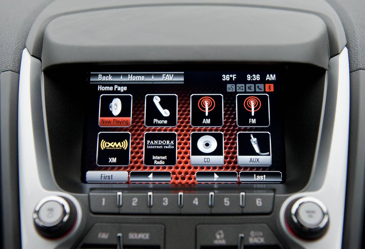 The 2012 GMC Terrain will be the first vehicle to offer GMC IntelliLink, which uses Bluetooth or USB to connect the drivers smartphone to Terrains new seven-inch, high-resolution, full-color touch screen display radio. IntelliLink allows smartphone control via voice activation and steering wheel-mounted controls, and streaming stereo audio from the phone through services like Pandora internet radio and Stitcher SmartRadio. Most importantly, IntelliLink enables seamless integration of stowed portable devices with Terrains infotainment system, allowing drivers to keep their hands on the wheel and eyes on the road. (GMC News Photo)