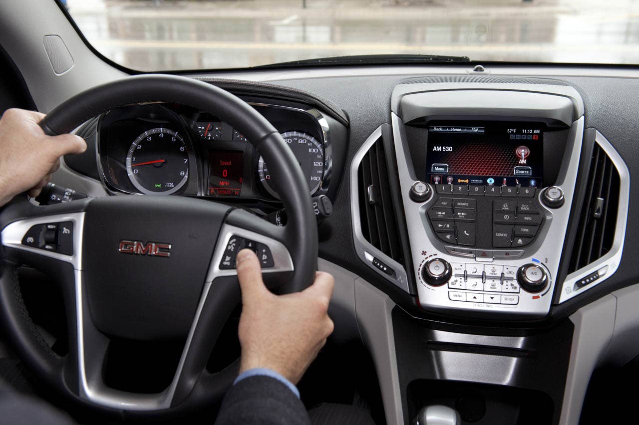 The 2012 GMC Terrain will be the first vehicle to offer GMC IntelliLink, which uses Bluetooth or USB to connect the drivers smartphone to Terrains new seven-inch, high-resolution, full-color touch screen display radio. IntelliLink allows smartphone control via voice activation and steering wheel-mounted controls, and streaming stereo audio from the phone through services like Pandora internet radio and Stitcher SmartRadio. Most importantly, IntelliLink enables seamless integration of stowed portable devices with Terrains infotainment system, allowing drivers to keep their hands on the wheel and eyes on the road. (GMC News Photo)
