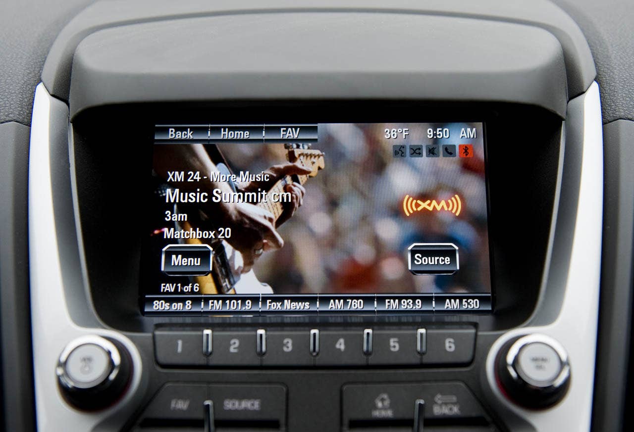 The 2012 GMC Terrain will be the first vehicle to offer GMC IntelliLink, which uses Bluetooth or USB to connect the drivers smartphone to Terrains new seven-inch, high-resolution, full-color touch screen display radio. IntelliLink allows smartphone control via voice activation and steering wheel-mounted controls, and streaming stereo audio from the phone through services like Pandora internet radio and Stitcher SmartRadio. Most importantly, IntelliLink enables seamless integration of stowed portable devices with Terrains infotainment system, allowing drivers to keep their hands on the wheel and eyes on the road. (GMC News Photo)