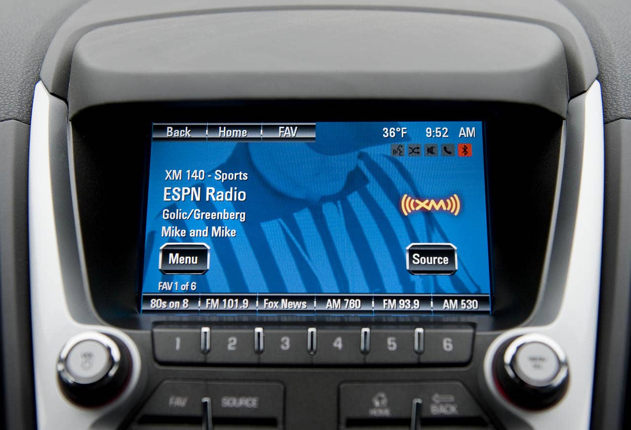 The 2012 GMC Terrain will be the first vehicle to offer GMC IntelliLink, which uses Bluetooth or USB to connect the drivers smartphone to Terrains new seven-inch, high-resolution, full-color touch screen display radio. IntelliLink allows smartphone control via voice activation and steering wheel-mounted controls, and streaming stereo audio from the phone through services like Pandora internet radio and Stitcher SmartRadio. Most importantly, IntelliLink enables seamless integration of stowed portable devices with Terrains infotainment system, allowing drivers to keep their hands on the wheel and eyes on the road. (GMC News Photo)