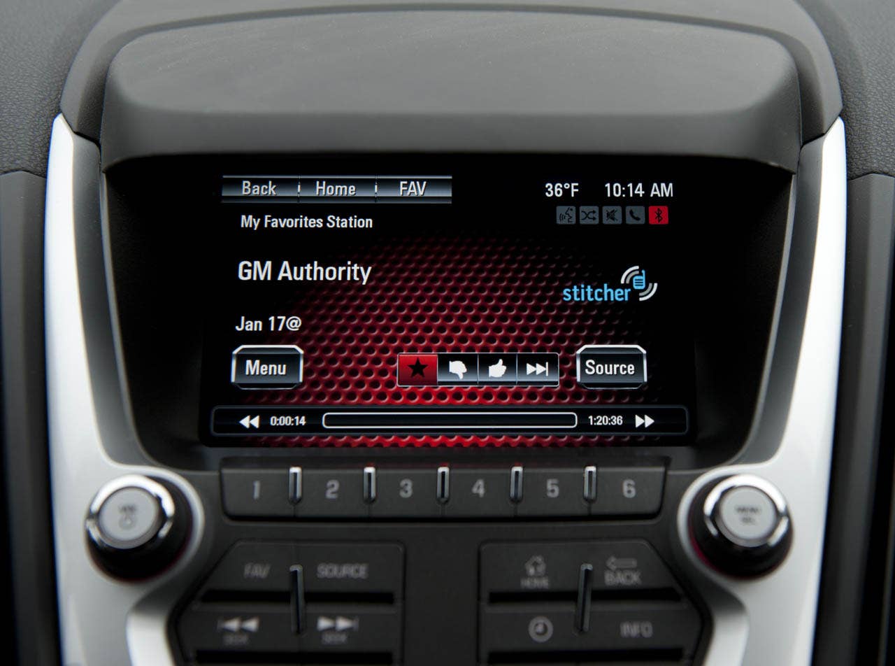 The 2012 GMC Terrain will be the first vehicle to offer GMC IntelliLink, which uses Bluetooth or USB to connect the drivers smartphone to Terrains new seven-inch, high-resolution, full-color touch screen display radio. IntelliLink allows smartphone control via voice activation and steering wheel-mounted controls, and streaming stereo audio from the phone through services like Pandora internet radio and Stitcher SmartRadio. Most importantly, IntelliLink enables seamless integration of stowed portable devices with Terrains infotainment system, allowing drivers to keep their hands on the wheel and eyes on the road. (GMC News Photo)