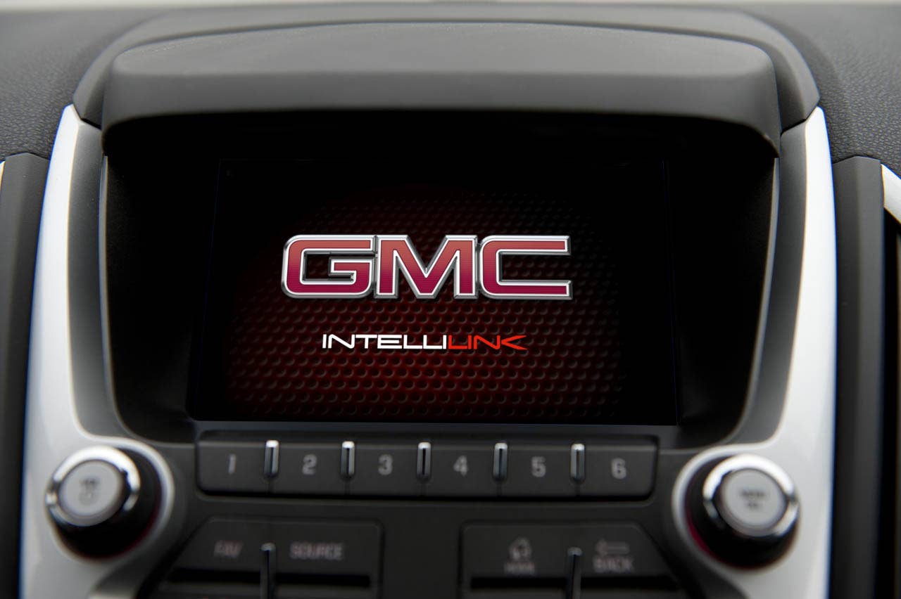 The 2012 GMC Terrain will be the first vehicle to offer GMC IntelliLink, which uses Bluetooth or USB to connect the drivers smartphone to Terrains new seven-inch, high-resolution, full-color touch screen display radio. IntelliLink allows smartphone control via voice activation and steering wheel-mounted controls, and streaming stereo audio from the phone through services like Pandora internet radio and Stitcher SmartRadio. Most importantly, IntelliLink enables seamless integration of stowed portable devices with Terrains infotainment system, allowing drivers to keep their hands on the wheel and eyes on the road. (GMC News Photo)