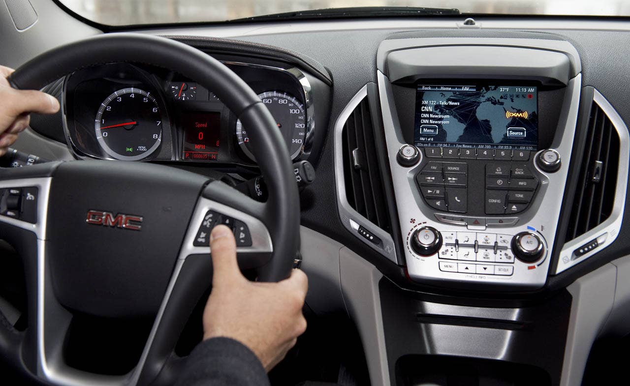 The 2012 GMC Terrain will be the first vehicle to offer GMC IntelliLink, which uses Bluetooth or USB to connect the drivers smartphone to Terrains new seven-inch, high-resolution, full-color touch screen display radio. IntelliLink allows smartphone control via voice activation and steering wheel-mounted controls, and streaming stereo audio from the phone through services like Pandora internet radio and Stitcher SmartRadio. Most importantly, IntelliLink enables seamless integration of stowed portable devices with Terrains infotainment system, allowing drivers to keep their hands on the wheel and eyes on the road. (GMC News Photo)